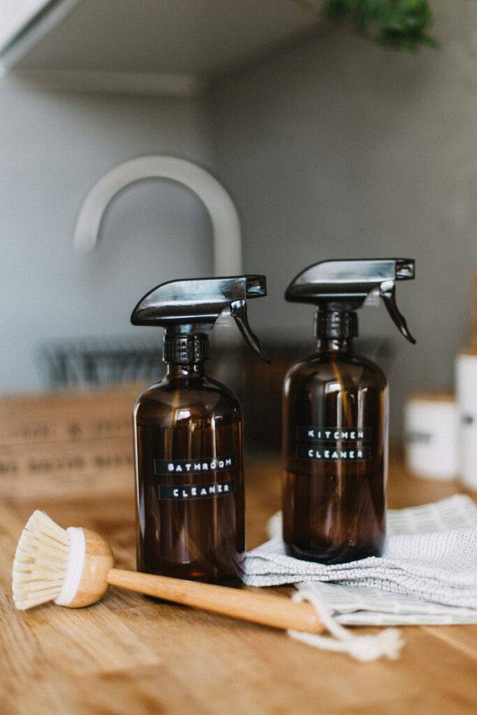 Bottles containing bathroom cleaner to show a clean hotel room